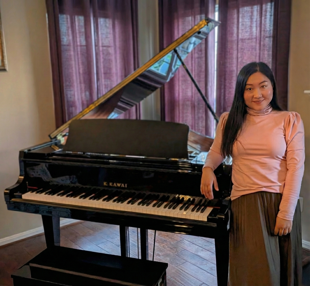 Yunbo Heater with her piano